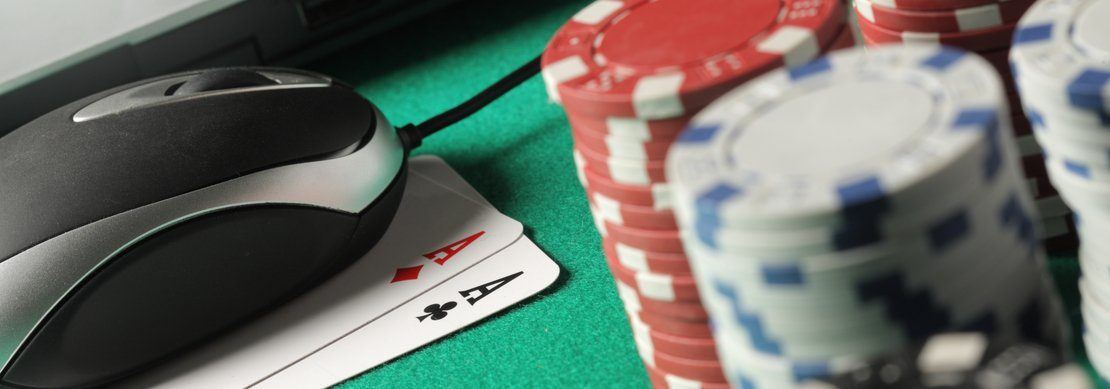 player playing video poker on his computer